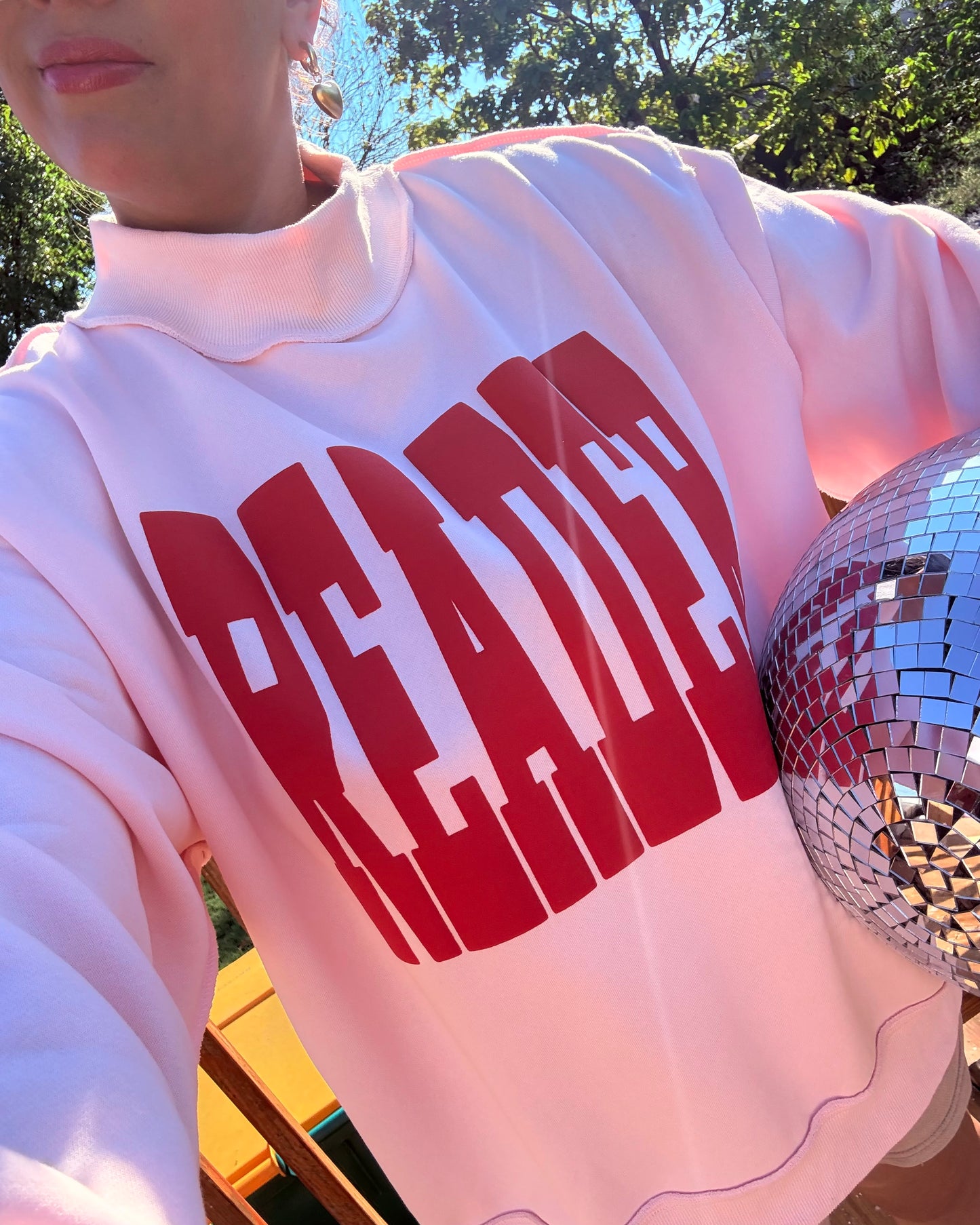 READER PUFF PRINT PINK MOCK NECK