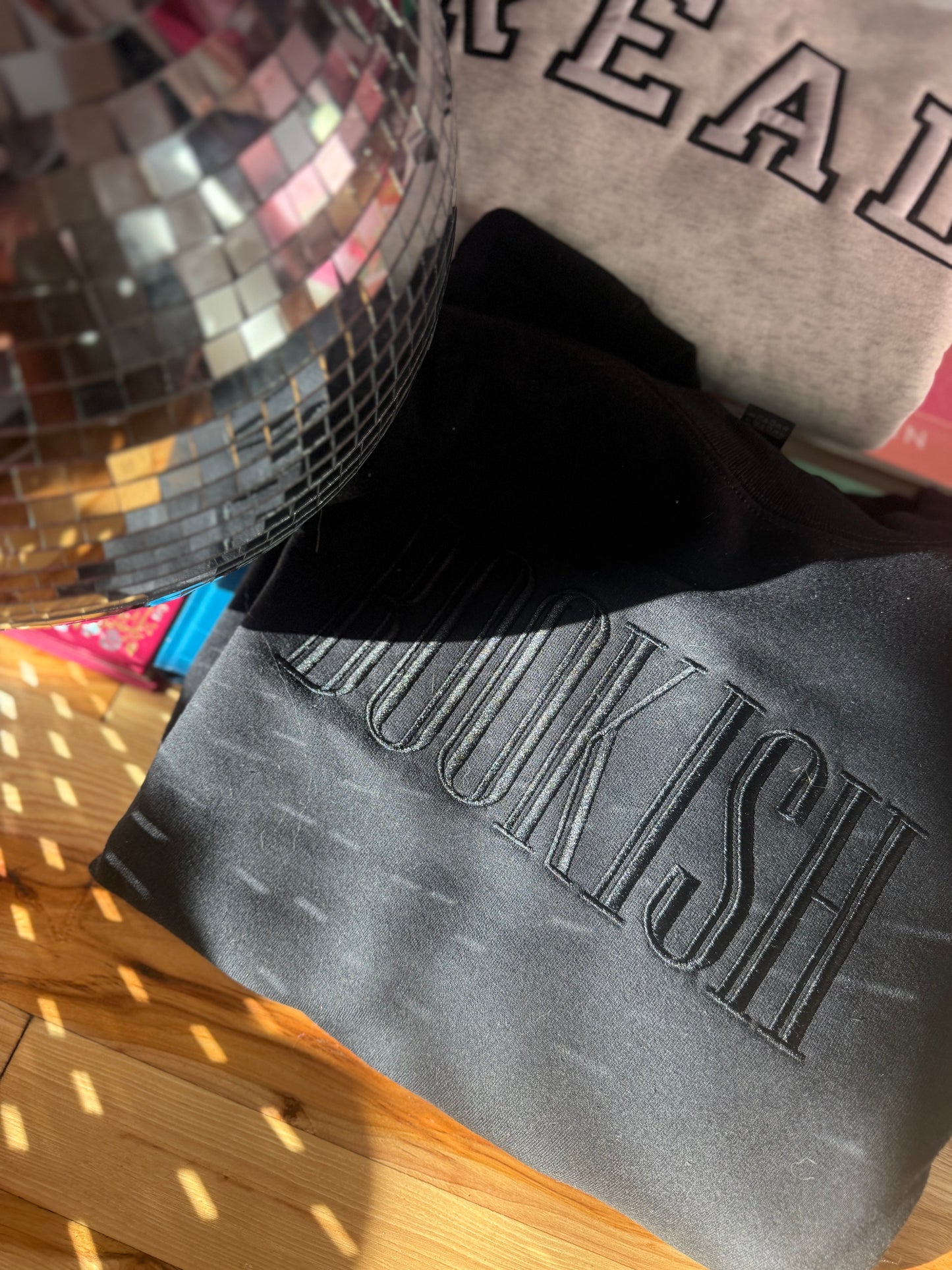 BLACK TONE ON TONE EMBROIDERED CREWNECK