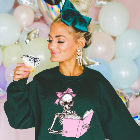 PINK SKELETON READING CREWNECK