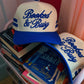 BOOKED & BUSY PUFF EMBROIDERY ROYAL BLUE STRIPED HAT