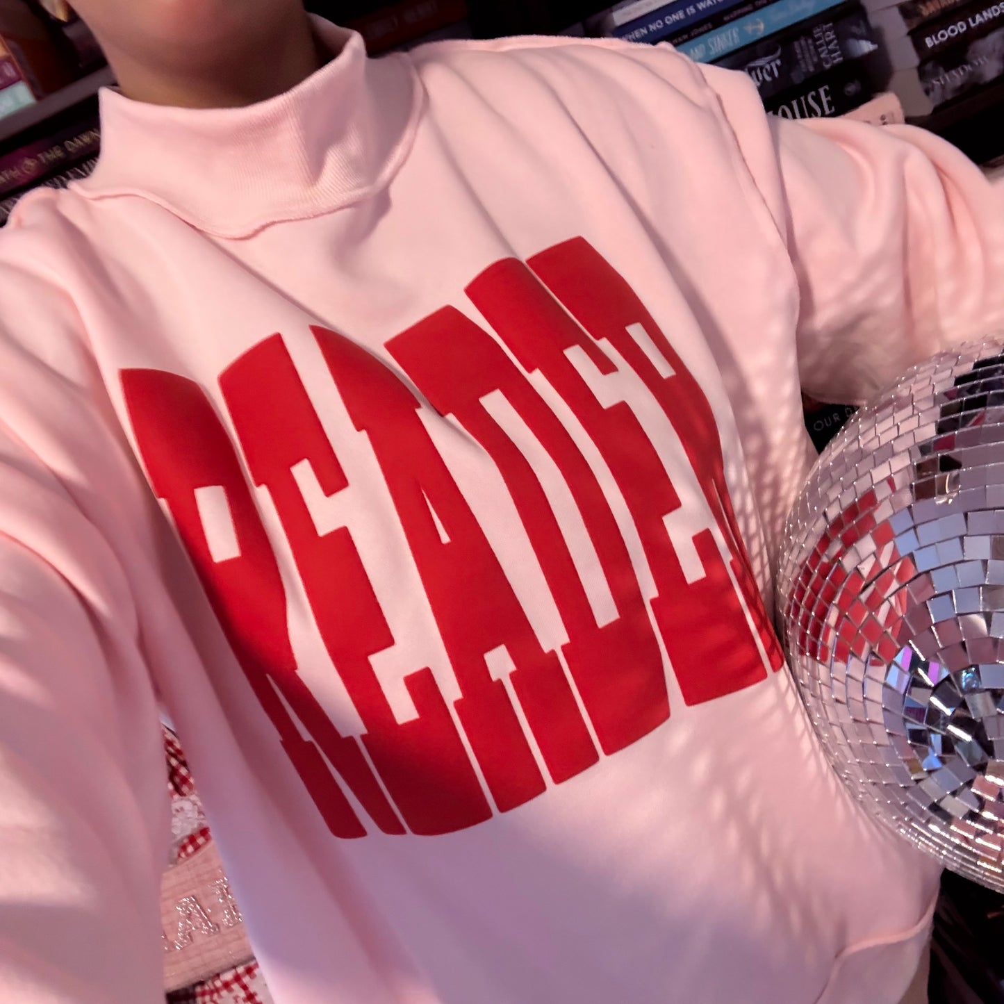 READER PUFF PRINT PINK MOCK NECK