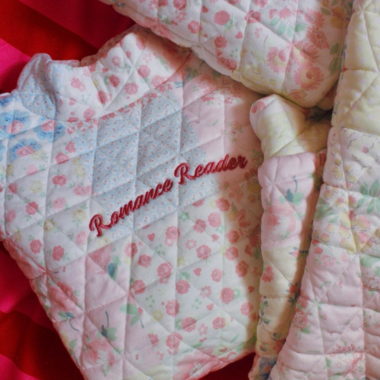 EMBROIDERED ROMANCE READER FLORAL PATTERN MOCK NECK