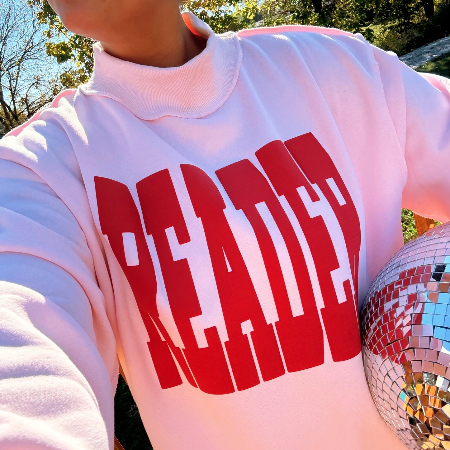 READER PUFF PRINT PINK MOCK NECK