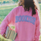 LIGHT BLUE BOOKISH GINGHAM APPLIQUÉ CREWNECK