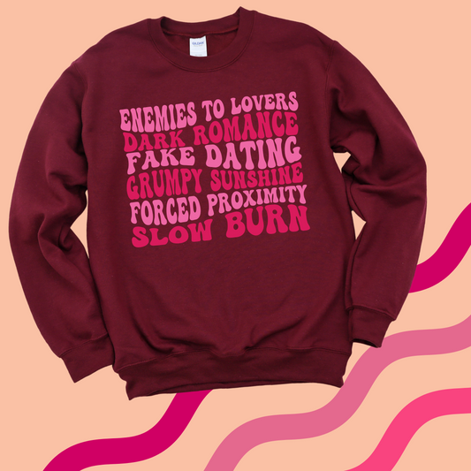 PINK TONED BOOK TROPE CREWNECK