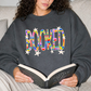 COLORFUL BOOKED WHIMSY CREWNECK